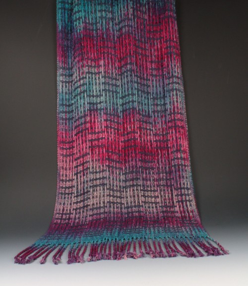 Rayon shawl woven in lace weave with hand dyed yarns by Amy Turner.